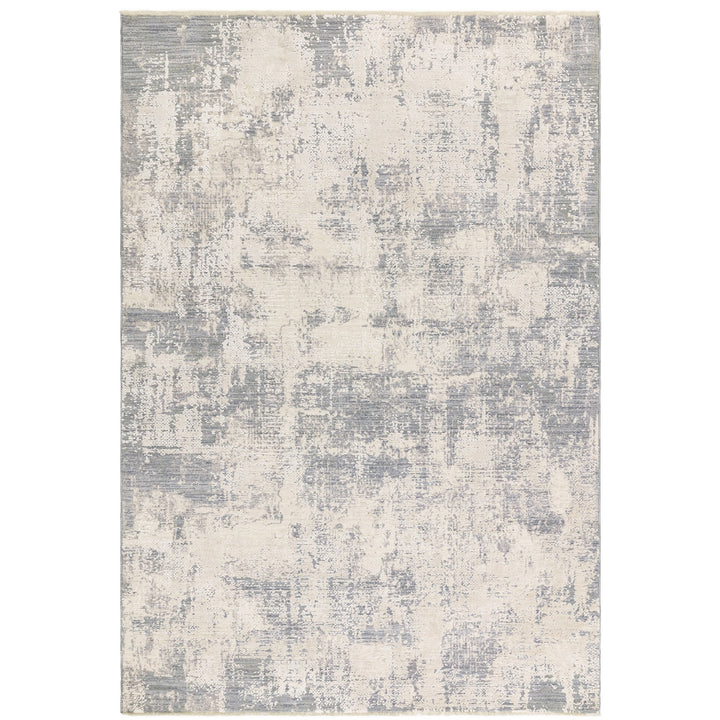 Contemporary design rug in spacedyed yarns in natural tones and subtle hues of grey. Size Large Pile height: 8mm Dimensions: 1600 x 2300 mm  Machine Woven in Turkey Material: polyester  Delivery: 5-7 days