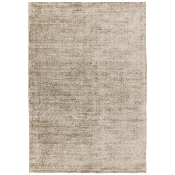 Luxury handwoven viscose rug, in a smoke colour, with a tip sheared finish giving a vintage effect. Size - Extra Large   Pile Height: 7mm   Dimensions: 2400 x 3400 mm    100% Viscose   Hand Woven in India   Delivery: 5-7 days