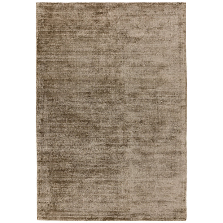 Luxury handwoven viscose rug, in mocha colour, with a tip sheared finish giving a vintage effect. Size - Extra Large   Pile Height: 7mm   Dimensions: 2400 x 3400 mm    100% Viscose   Hand Woven in India   Delivery: 5-7 days