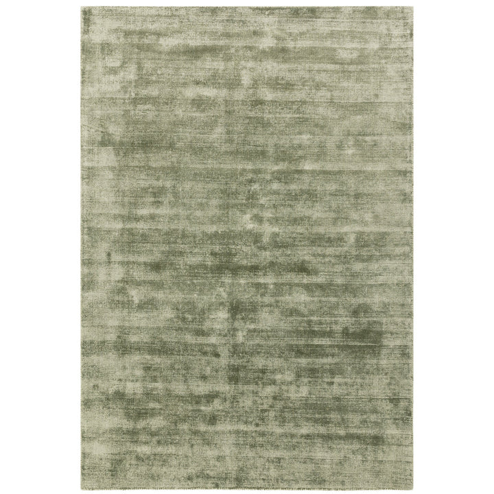 Luxury handwoven viscose rug, in sage colour, with a tip sheared finish giving a vintage effect. Size - Extra Large   Pile Height: 7mm   Dimensions: 2400 x 3400 mm    100% Viscose   Hand Woven in India   Delivery: 5-7 days