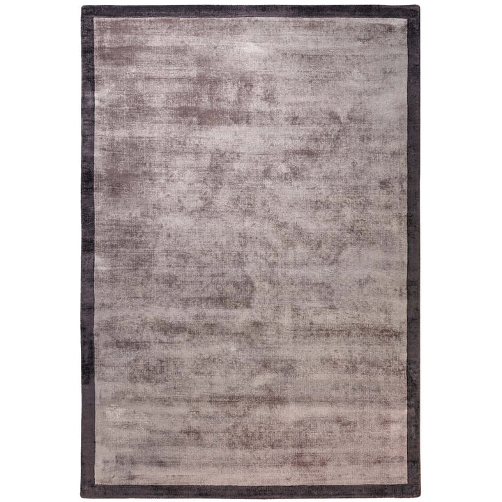 Luxury handwoven viscose rug, in moleskin with a narrow charcoal boarder, with a tip sheared finish giving a vintage effect. Size - Square Large   Pile Height: 7mm   Dimensions: 2000 x 2000 mm  100% Viscose   Hand Woven in India  Delivery: 5-7 days
