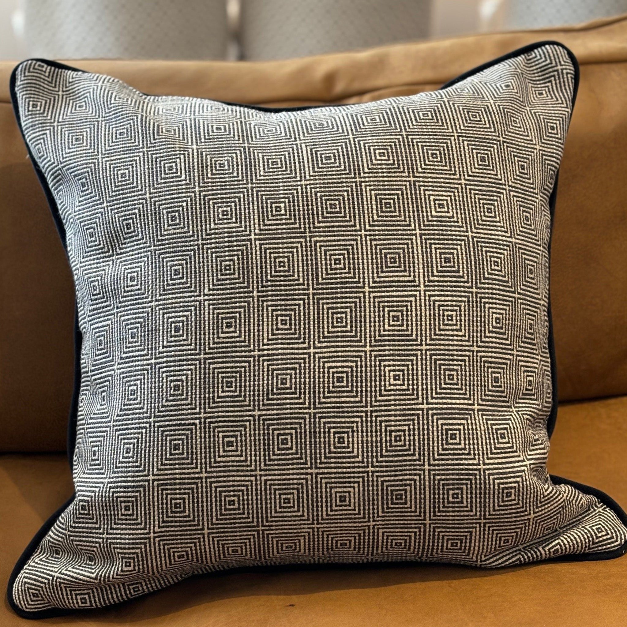 Black and White Geometric Patterned Cushion with Black Piping
