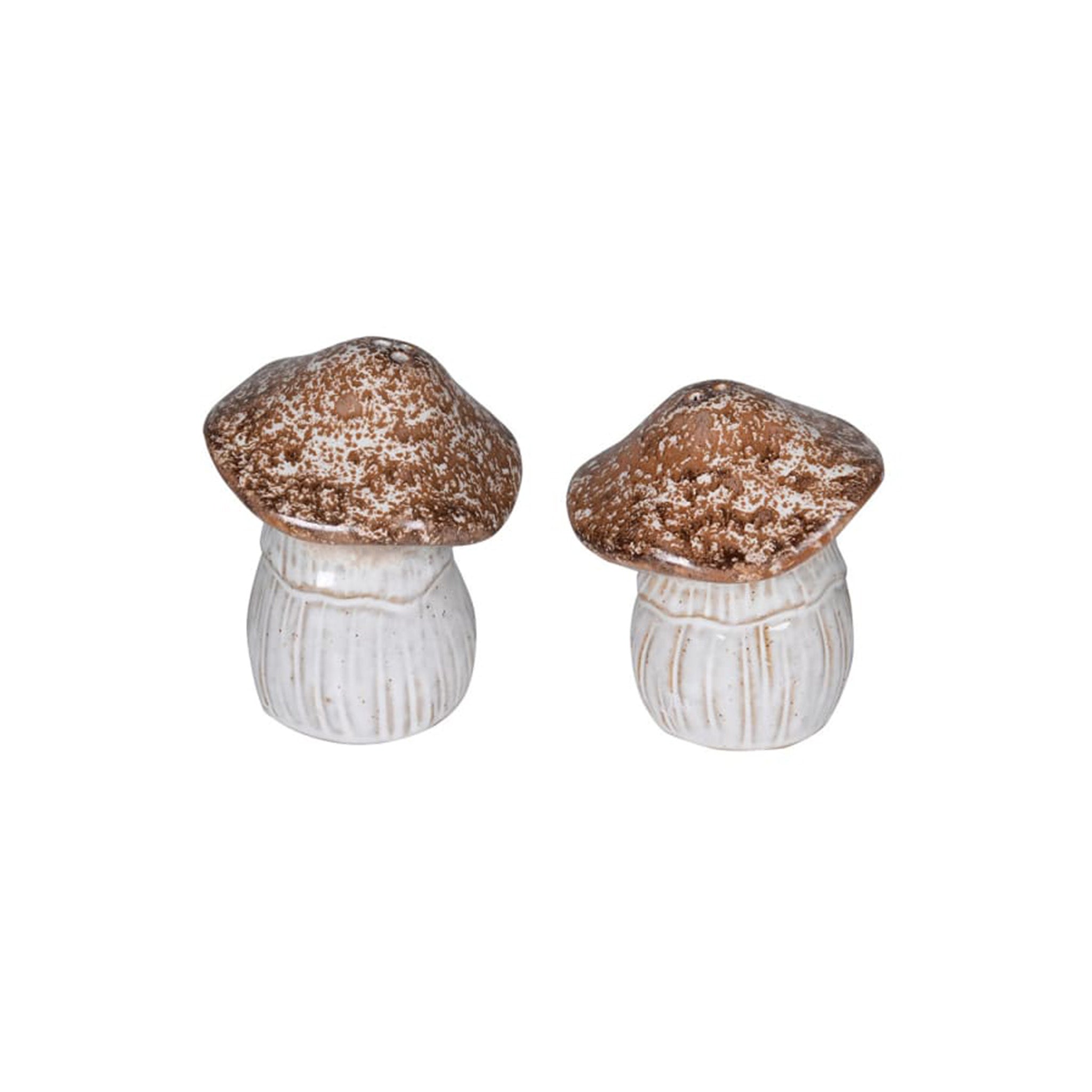 A ceramic salt and pepper shaker set shaped as porcini mushrooms, with a speckled brown cap and ribbed cream stem