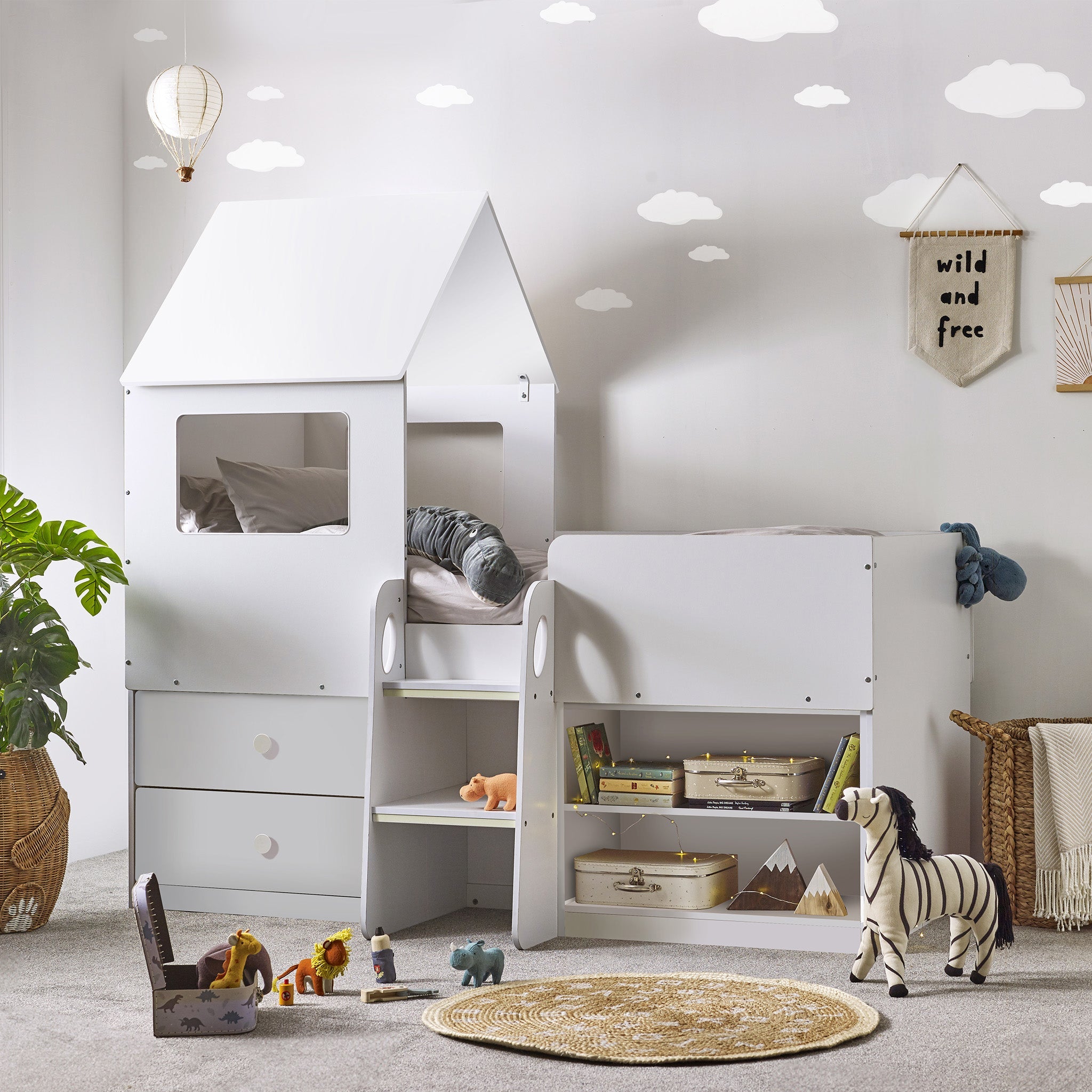 A House Style Midsleeper bed, designed to capture the imagination of your little ones. Finished in white, this enchanting bed features two pull-out drawers and open shelving. The two-step study glow-in-the-dark ladder adds a playful touch, leading to the cozy haven on top complete with a wonderful roof and two opened windows on each side. Dimensions: D:197 W:120 H:185cm