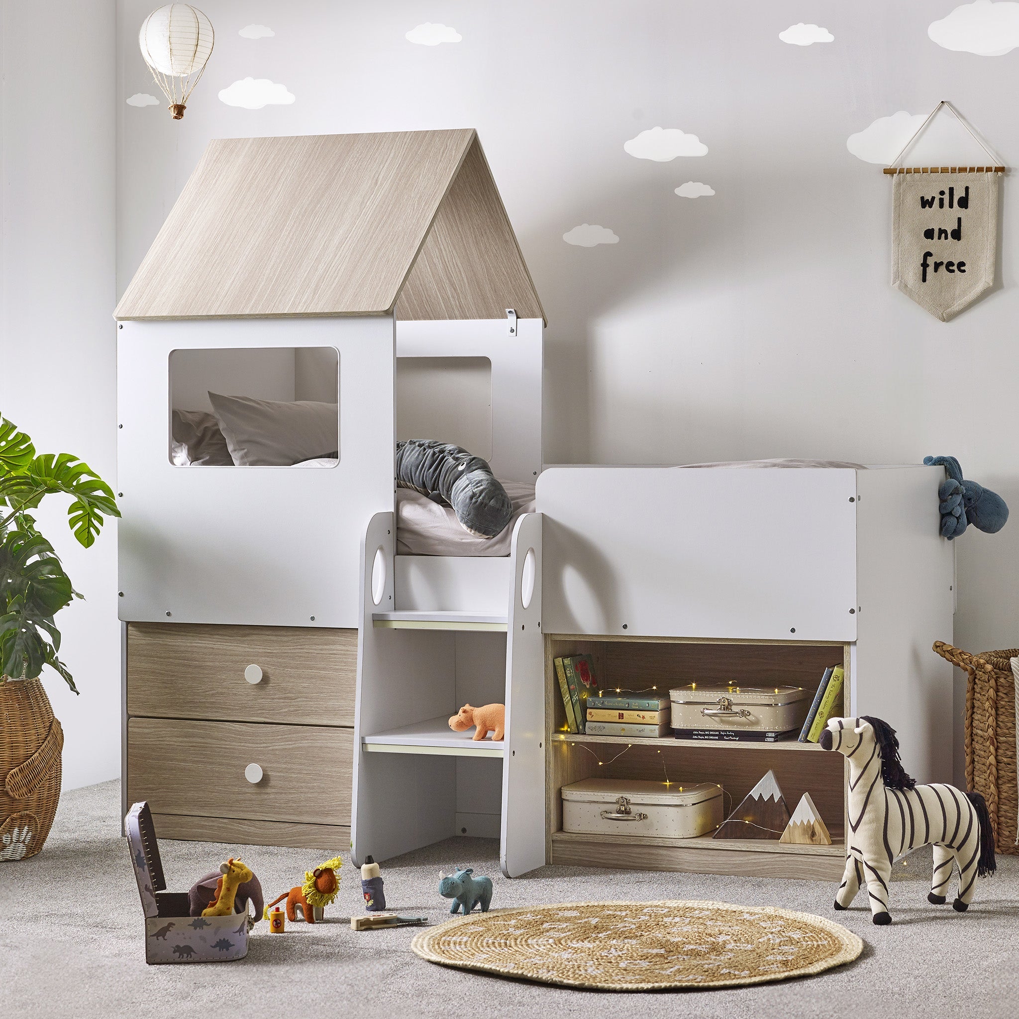 A delightful house-style bed designed to capture the imagination of your little ones. Finished in a charming woodgrain 
and white, features two pull-out drawers and open shelving. The two-step study glow-in-the-dark ladder adds a playful touch, leading to the cosy haven on top complete with a wonderful roof and two opened windows on each side. Dimensions: D:197 W:120 H:185cm