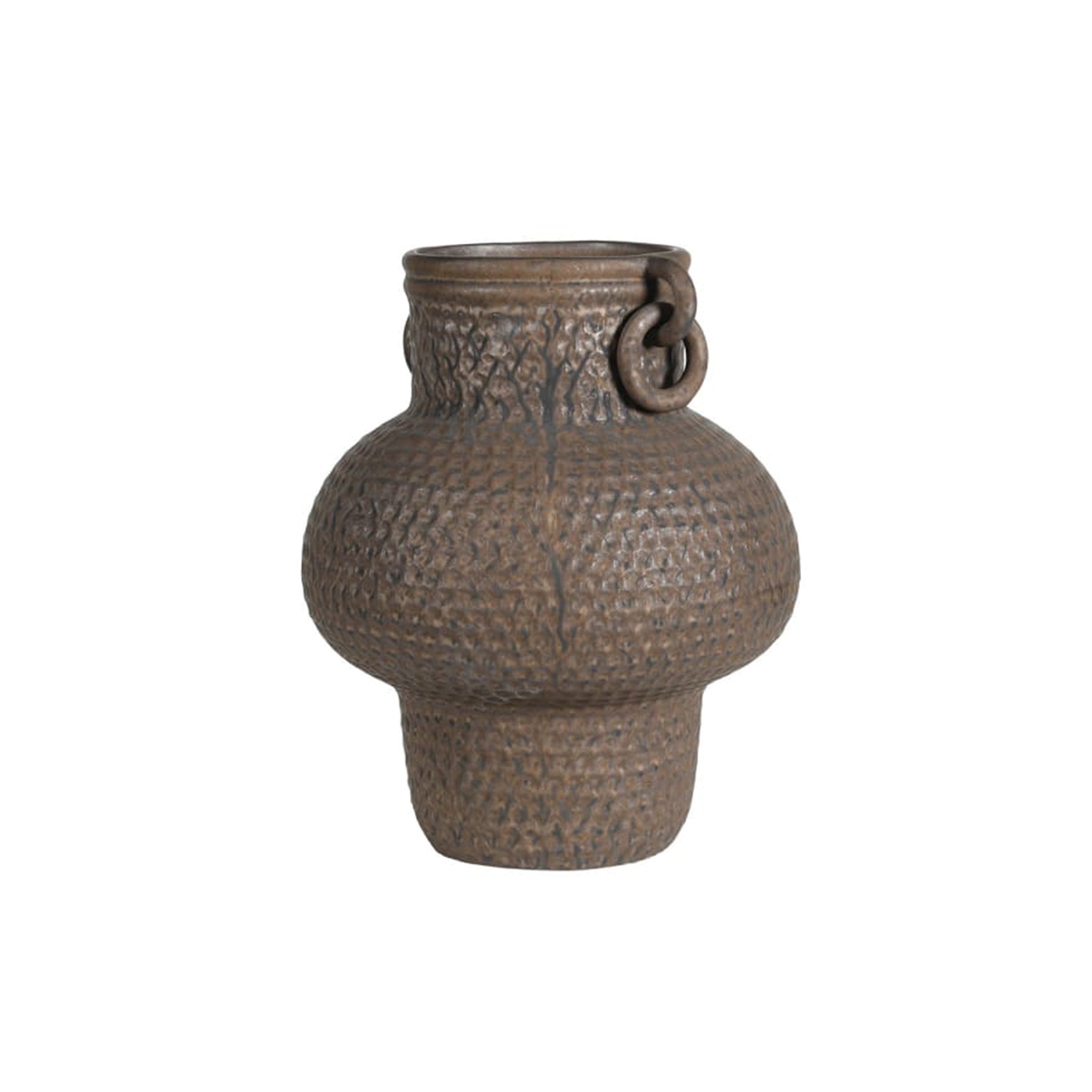A striking rounded body vase with a full, finished with two small ring handles at the neck. The surface is richly textured with a hammered, woven-look pattern in a deep bronze-brown glaze, with darker tones settling into the recesses for added depth. Delivery: 7-10 days depending on stock availability